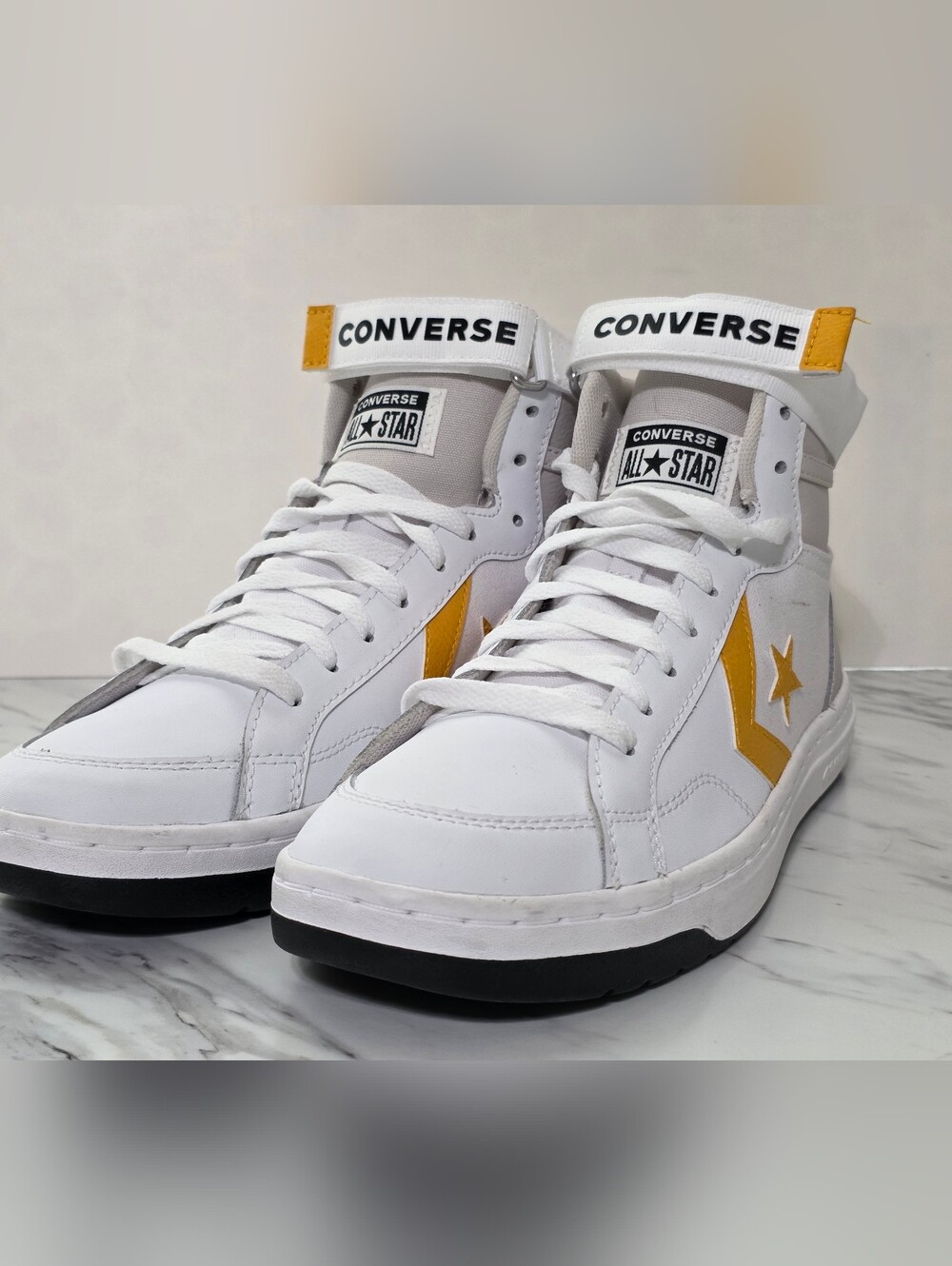 Converse White High-Top Sneakers with Yellow Accents